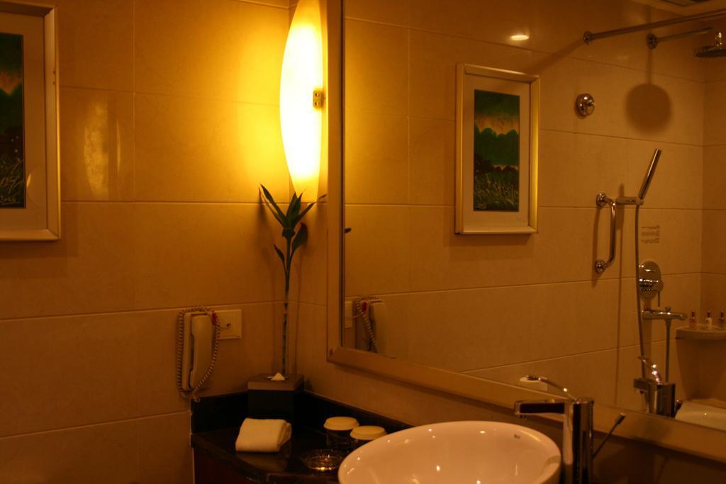 Merryland Traders Hotel Changshu الغرفة الصورة